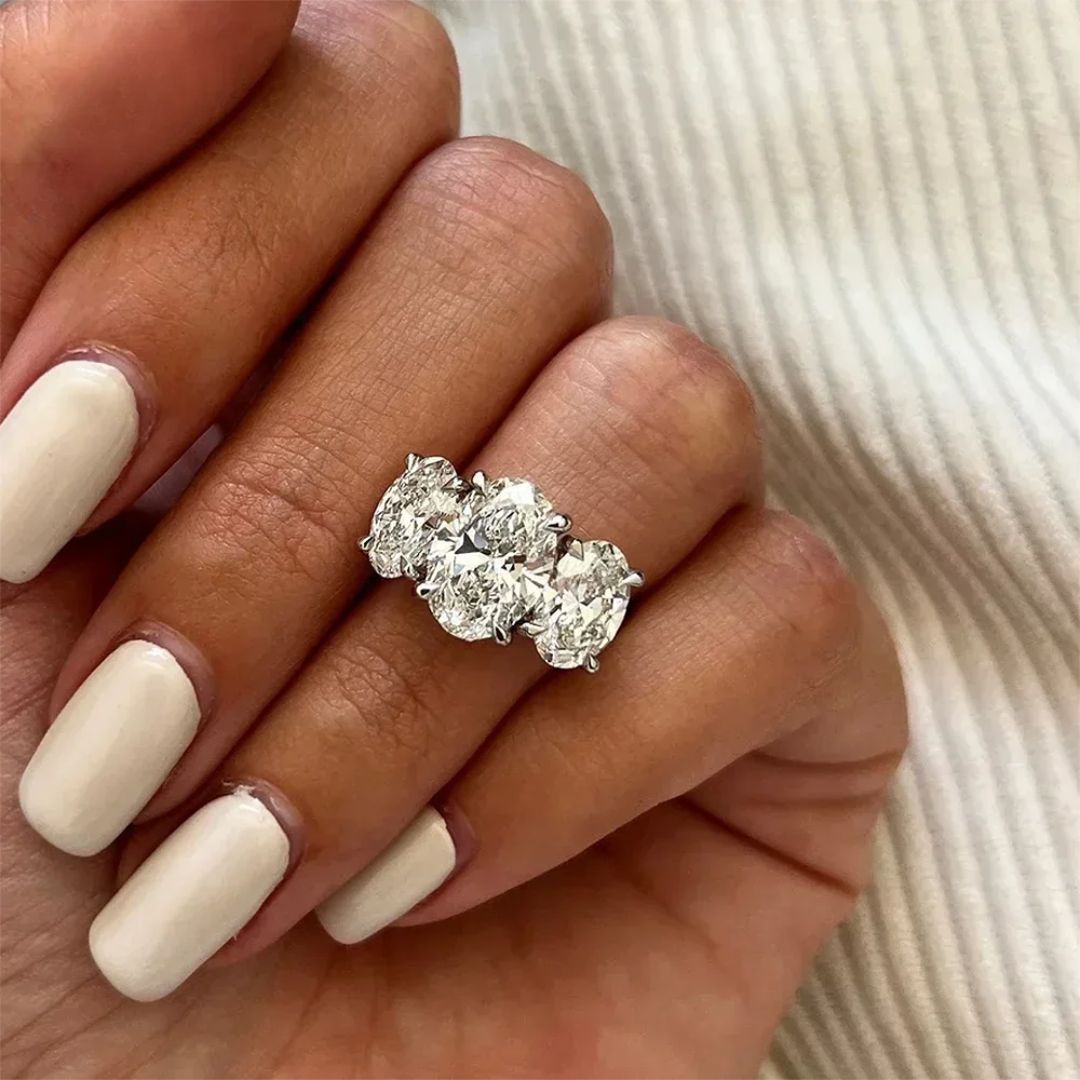 Aurelia Trinity - Moissanite Driesteenring met 18k Wit Goud