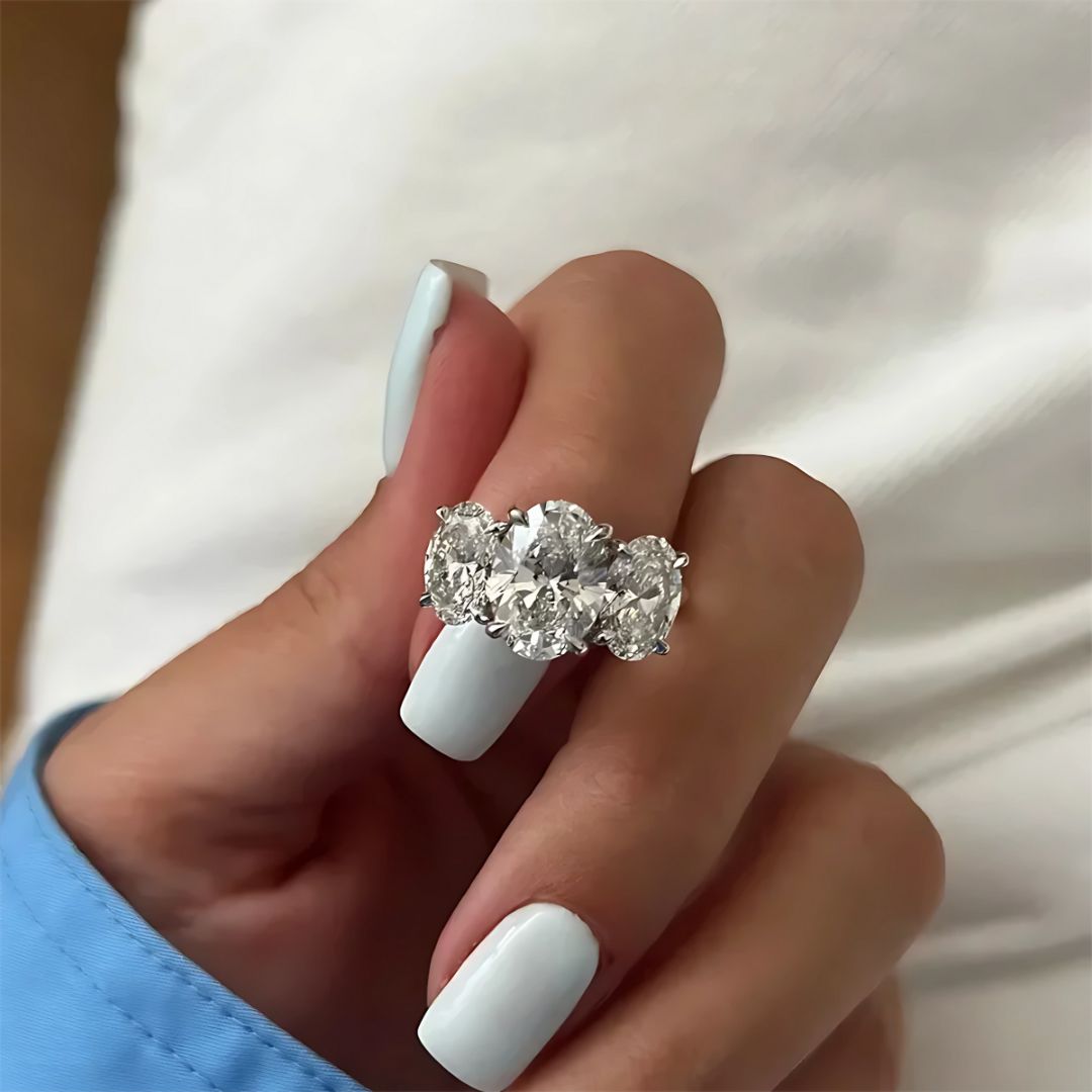 Aurelia Trinity - Moissanite Driesteenring met 18k Wit Goud