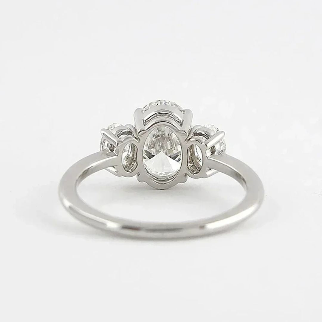 Aurelia Trinity - Moissanite Driesteenring met 18k Wit Goud